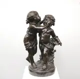 Auguste Moreau, Les Deux Enfants a la Gerbe de Fleurs, Patinated bronze statue on a circular marble base. - Height (statue): 16.5 inches; base: 1.75 inches