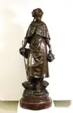 Eutrope Bouret, The Shepherd Girl, Bronze with brown patina on a red-marble rotating base