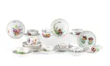 10 Tassen und 13 Untertassen mit verschiedenen Blumendekoren by Meissen, Porzellan, farbig staffiert, sold Jan 2025
