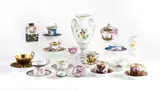 Porzellankonvolut mit 28 Teilen by Meissen, Meissen, farbig staffiert, gold dekoriert, sold Jan 2025