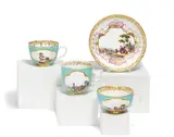 Tasse mit Untertasse und zwei Tassen mit Türkisfond und Landschaftskartuschen by Meissen, Um 1740, Porzellan, farbig und gold dekoriert, sold Nov 2023