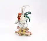 Krähender Hahn auf Holzscheiten by Meissen, 1975, Porzellan, farbig dekoriert, sold Nov 2023