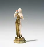 Ferdinand Preiss, Aphrodite with rose, ivory, rose patinated red; bronze, painted; onyx base; reverse of the base signed "F. Preiss"
