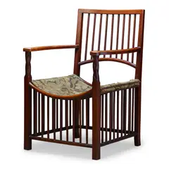 ARTS & CRAFTS SPINDLE ARMCHAIR, CIRCA 1890 by Liberty & Co., 1890, walnut, sold Apr 2026