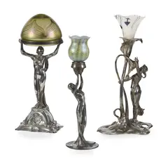 JUGENDSTIL TABLE LAMP, CIRCA 1900 by Wmf, 1900, silvered metal with associated glass shades, 43cm and 36cm high (3), sold Apr 2025