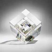 Early Cube by Jon Kuhn, c. 1985, ground, polished, and laminated glass, sold May 2025
