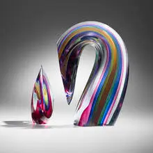 Ruby/Blue Slice Descending Form 2 by Harvey Littleton, 1984, cased, hot-worked, cut, and polished glass, sold May 2025