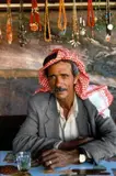 Vivian Ronay, Portrait of Dahkilallah at his Old Café, 1988, Photograph