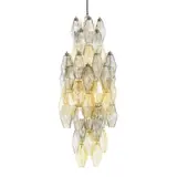 Carlo Scarpa, ‘POLIEDRI' CHANDELIER FOR VENINI, Composed of faceted poliedri Murano glass elements in graduated tones, suspended from a metal frame