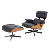LOUNGE CHAIR AND OTTOMAN FOR HERMAN MILLER by Charles and Ray Eames, Black leather upholstery with veneered, moulded ply shell on aluminium star swivel base. Manufacturer badge present to u, sold Jun 2026