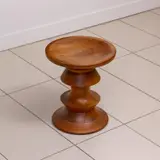 STOOL IN WALNUT FOR HERMAN MILLER by Charles and Ray Eames, The versatile stool, table, or object d'art in turned walnut, sold Nov 2025