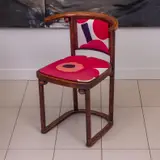 Josef Hoffmann, 'FLEDERMAUS' CHAIR MANUFACTURED BY WITTMAN, Featuring a curved timber frame and re-upholstered in Marimekko floral fabric