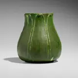 Vase with leaves by Marie Seaman for Grueby Faience Company, 1898-1910, glazed earthenware, sold May 2025