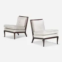 Slipper lounge chairs, pair by T. H. Robsjohn-Gibbings, c. 1955, upholstery, lacquered wood, sold Sep 2022