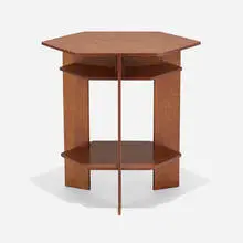 Wingspread hexagonal occasional table by Frank Lloyd Wright, oak plywood, sold Sep 2022
