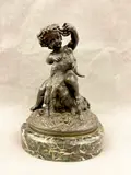 Michel Clodion, Bacchus Feeding Grapes to Goat, On marble oval plinth