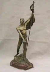 Fernand Hamar, La Resolution, Paris", on a red marble base. - Height overall 22.25 inches; Depth 8.5 inches The lifelong collection of Bernie Delia