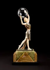 Lighter than Air by Ferdinand Preiss, cold-painted bronze and carved ivory, marble base, sold Dec 2011