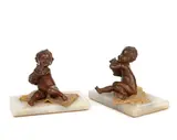 Carl Kauba, A pair of Putti on carpets (two)