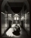 Jerry Uelsmann, Untitled (Reclining nude in hallway)