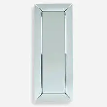 Caadre standing mirror by Philippe Starck, 1998, beveled and curved mirrored glass, sold Apr 2022