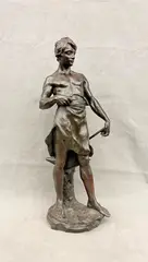 Antoine Bofill, A Blacksmith in Sheepskin, Patinated bronze sculpture with brown patina