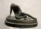 Continental School, After the Antique: The Dying Gaul, Patinated bronze presented on a granite or marble base. - (approximate) Width: 7 inches ; Height: 4.5 inches