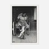 Bruce Davidson, Child on a Front Porch Playing with her Doll Baby, Shelby County, TN