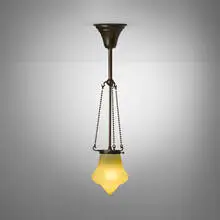 Hanging shade by Tiffany Studios, c. 1910, patinated bronze, hand-blown Favrile glass, sold Apr 2025
