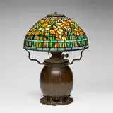 Daffodil table lamp by Tiffany Studios, c. 1910, leaded glass, patinated bronze, sold Apr 2025