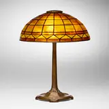 Colonial table lamp by Tiffany Studios, c. 1910, leaded glass, patinated bronze, sold Apr 2025