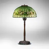 Dogwood Band table lamp by Tiffany Studios, c. 1910, leaded glass, patinated bronze, sold Apr 2025