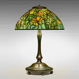 Tulip table lamp by Tiffany Studios, c. 1910, leaded glass, patinated bronze, sold Apr 2025