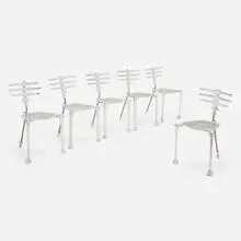 Michael Aram, Skeleton dining chairs from the Flights of Fancy series, set of six, 1994-97, cast aluminum, steel, matte chrome-plated steel