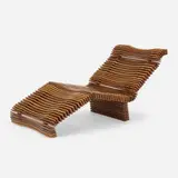 Hawaiian chaise lounge by Pacific Green Furniture, c. 1985, palmwood, rubber, brass, sold Apr 2022