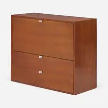 Drop-front secretary by George Nelson & Associates, c. 1950, walnut, aluminum, sold Feb 2022