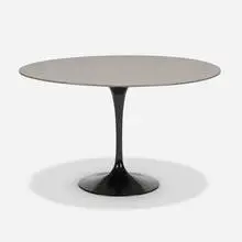 Eero Saarinen, Dining table, c. 1990, Corian, enameled aluminum