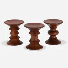 Time Life stools, set of three by Charles and Ray Eames, 1960, walnut, sold Feb 2022