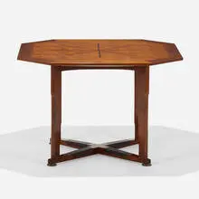 Edward Wormley, Octagonal dining table, model 5721, c. 1965, walnut, rosewood inlay, leather, brass