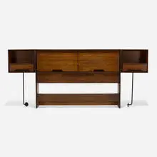 Full-size headboard by Milo Baughman, c. 1955, mahogany, enameled steel, plastic, sold Feb 2022