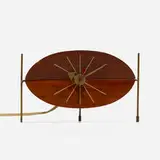 Watermelon table clock, model 2219D by George Nelson & Associates, 1954, walnut, enameled steel, enameled aluminum, lacquered wood, sold Feb 2022