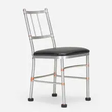Chair by Warren McArthur, 1930, aluminum, leather, copper, rubber, sold Feb 2022