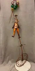 Jim Lewk, Gentleman on a Unicycle, It is all displayed on white marble plinth base