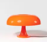 Artemide, Tischleuchte "Nessino", Orangefarbener Kunststoff. Elektrifiziert mit vier Fassungen