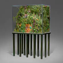 Max Hooper Schneider, The Extinction of Neon, 2015, custom acrylic terrarium, modeled landscape, plastic flora and vegetation, vintage neon signs, custom metal base