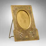 Abalone picture frame by Tiffany Studios, c. 1920, acid-etched and gilt bronze, mother-of-pearl, sold Apr 2025