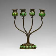 Candelabrum by Tiffany Studios, c. 1910, patinated bronze, hand-blown glass, sold Apr 2025