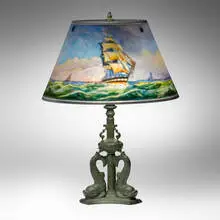 Pairpoint, Nautical table lamp, c. 1915, reverse-painted frosted glass, patinated metal