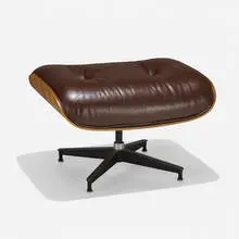 671 ottoman by Charles and Ray Eames, 1956 / 1976, leather, rosewood plywood, enameled aluminum, sold Feb 2022