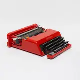 Valentine typewriter by Ettore Sottsass, 1969, plastic, enameled steel, metal, rubber, sold Jan 2022